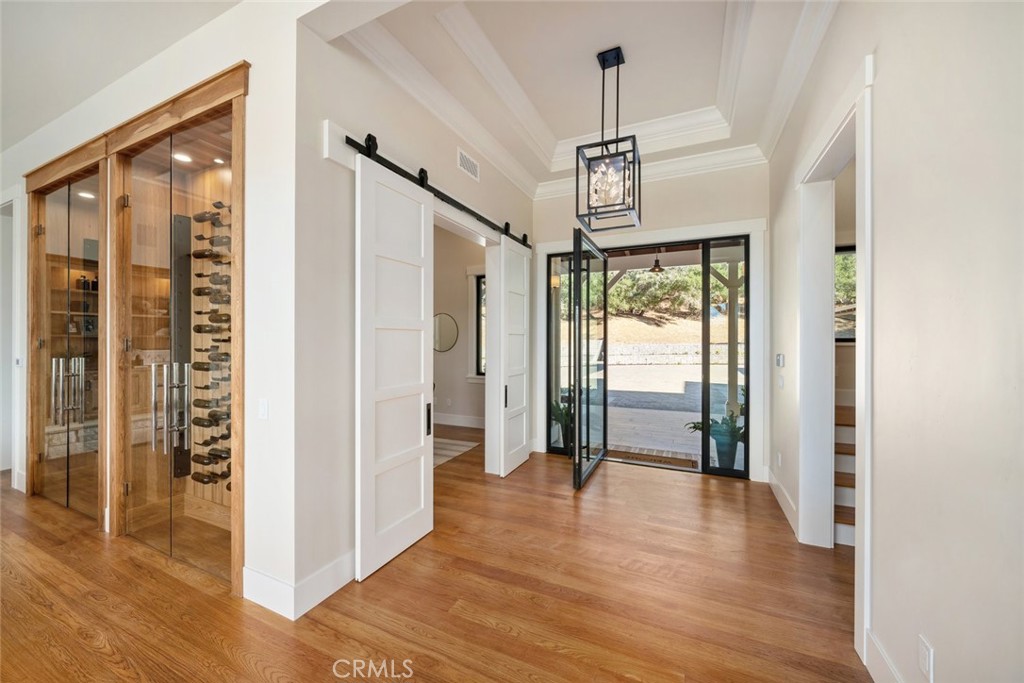 610 Spanish Springs Drive San Luis Obispo, CA 93401 - Photo 50 of 75 a view of hallway with wooden floor and windows