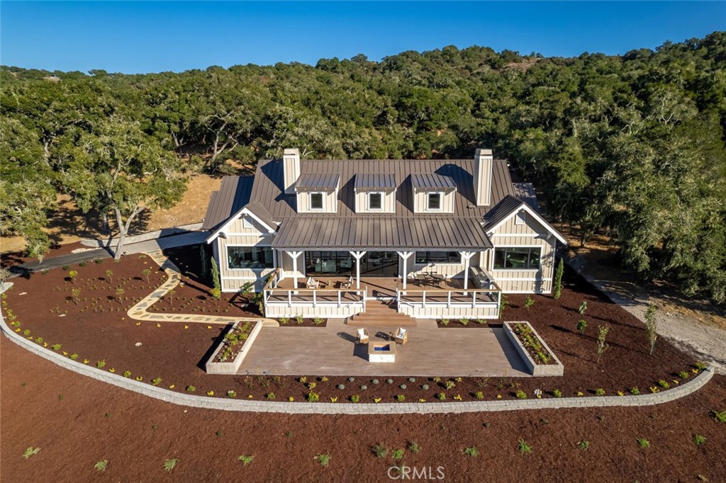 610 Spanish Springs Drive San Luis Obispo, CA 93401 - Photo 57 of 75 a view of a house with a swimming pool and a yard