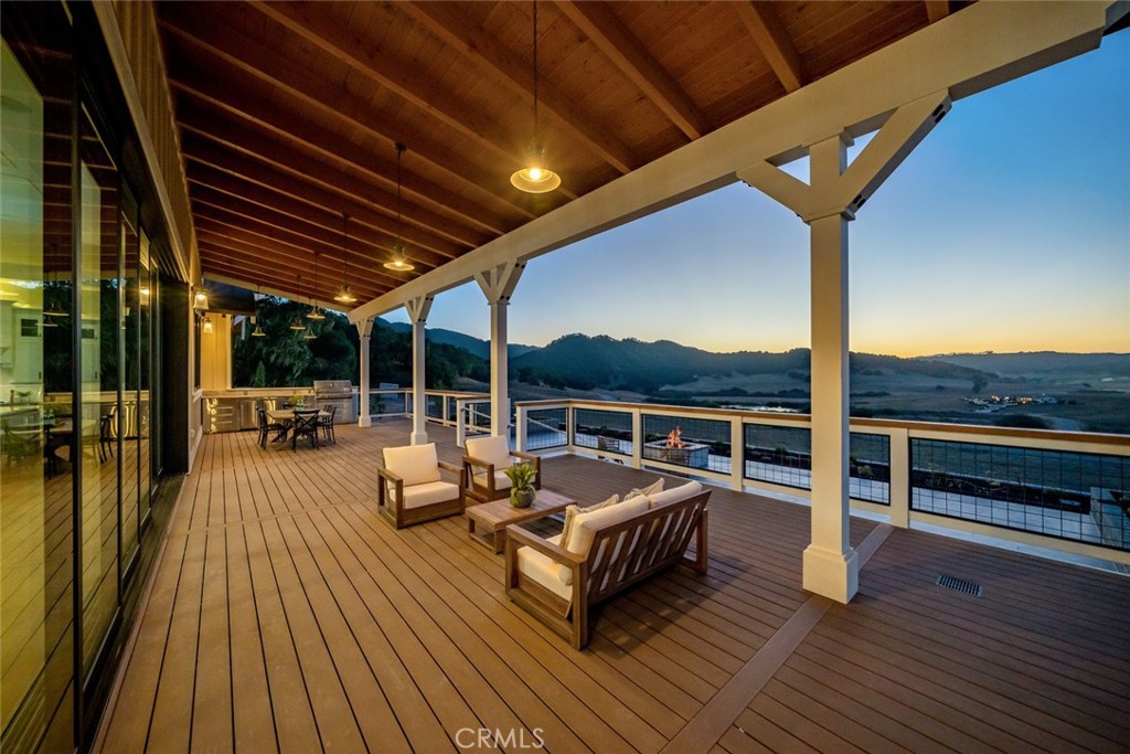610 Spanish Springs Drive San Luis Obispo, CA 93401 - Photo 71 of 75 a view of a balcony with chairs and wooden floor