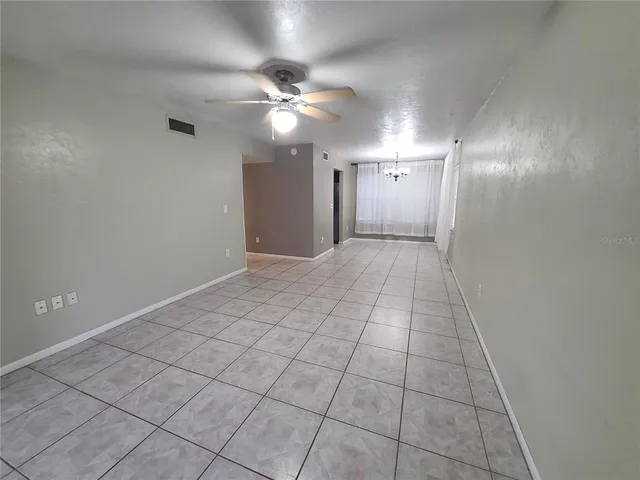 a bathroom with a vanity and a shower