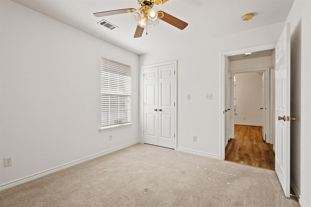 623 Madison Place Sherman, TX 75092 - Photo 24 of 37 a view of an empty room with a window