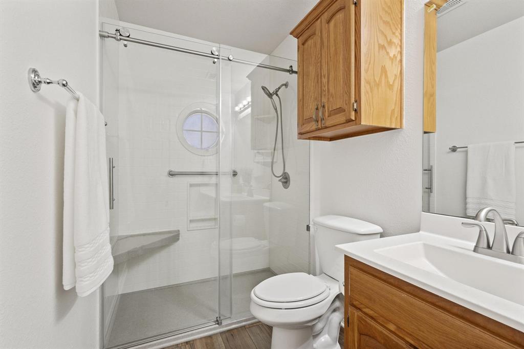 623 Madison Place Sherman, TX 75092 - Photo 27 of 37 a bathroom with a sink toilet and shower