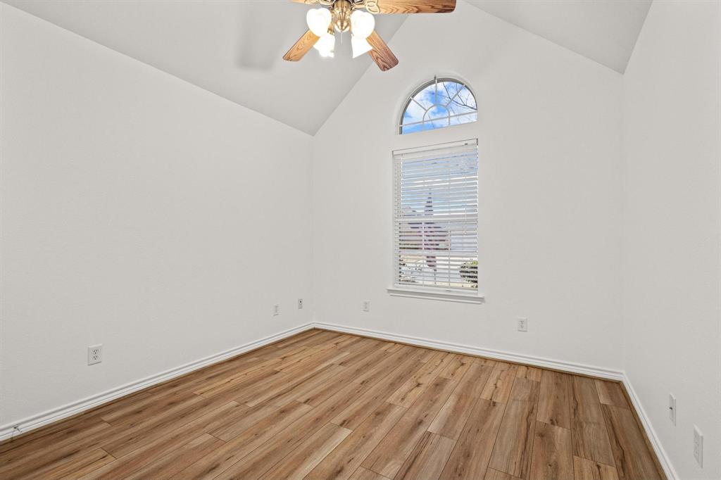 623 Madison Place Sherman, TX 75092 - Photo 28 of 37 an empty room with a hardwood and ceiling fan