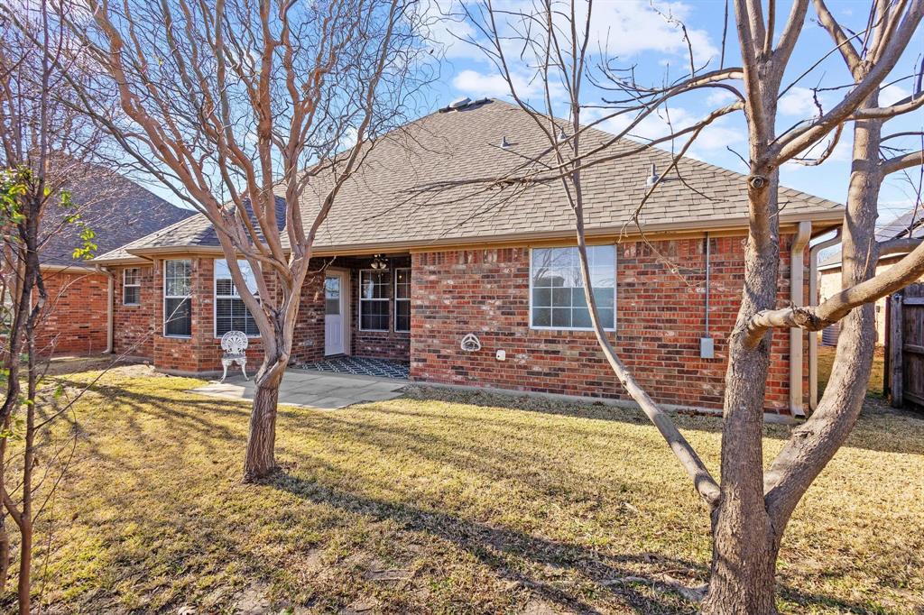 623 Madison Place Sherman, TX 75092 - Photo 33 of 37 a view of a house with snow on the wall