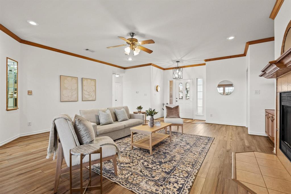 623 Madison Place Sherman, TX 75092 - Photo 7 of 37 a living room with furniture and wooden floor