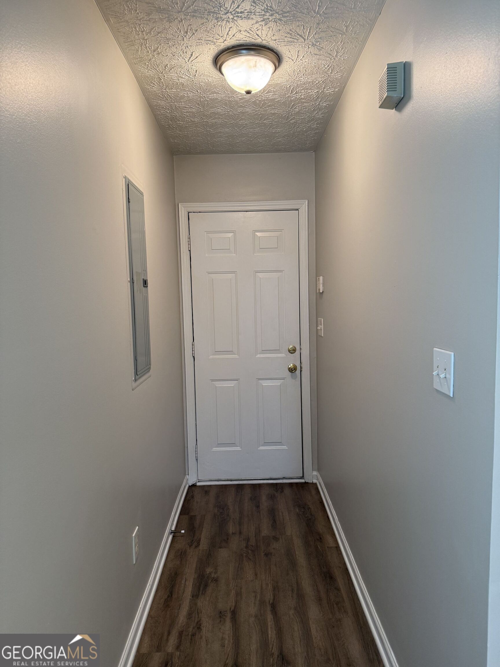 6132 Ruth Street Southwest Covington, GA 30014 - Photo 30 of 33 wooden floor in an empty room