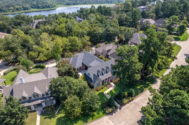 an aerial view of a house with a garden