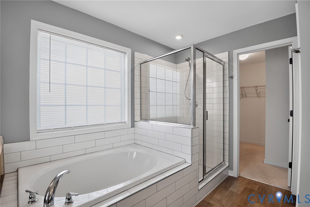 7825 Old Guild Road Richmond, VA 23237 - Photo 22 of 35 Bathroom featuring a white subway tile tub surroun