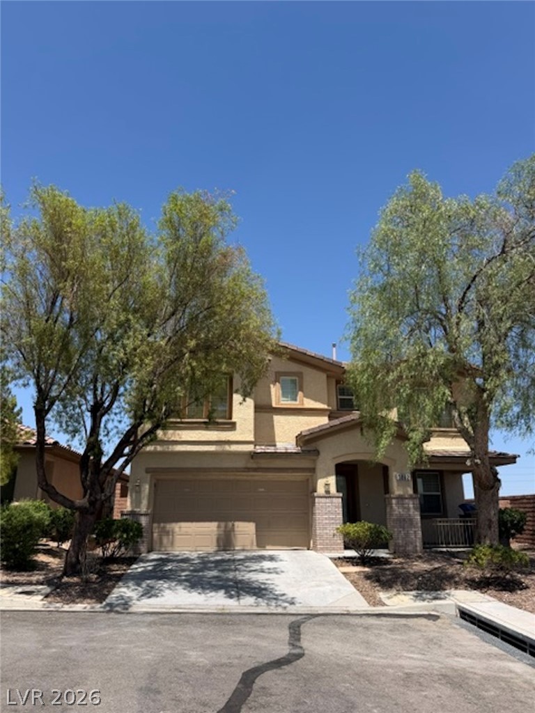 3862 Landing Ridge Place Las Vegas, NV 89135 - Photo 1 of 26 A well-maintained facade with an attached garage and welcoming covered entry creates a pleasing street presence.