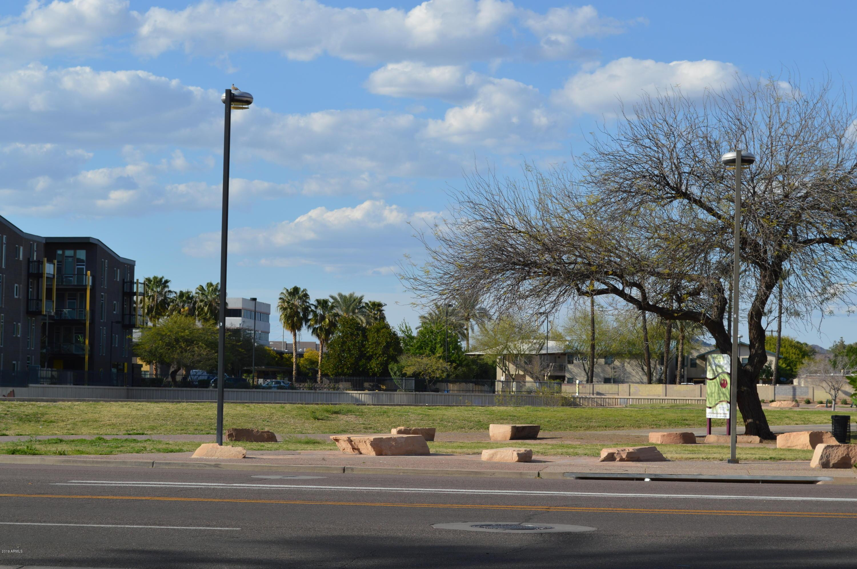 1701 East Colter Street, Unit 454 Phoenix, AZ 85016 - Photo 18 of 40 a view of lake with green space
