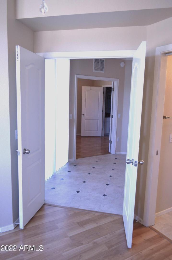 1701 East Colter Street, Unit 454 Phoenix, AZ 85016 - Photo 35 of 40 a view of hallway with wooden floor