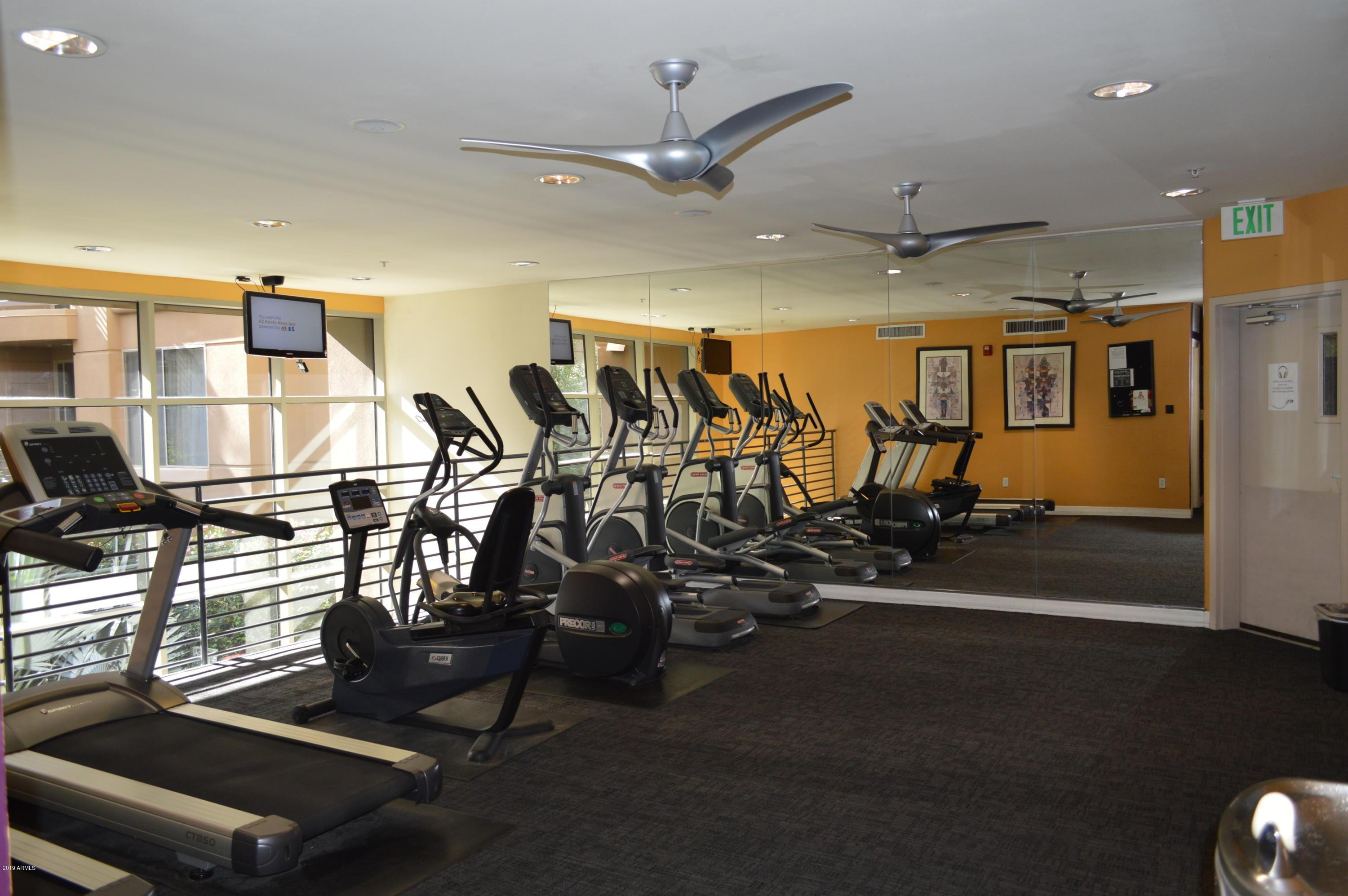 1701 East Colter Street, Unit 454 Phoenix, AZ 85016 - Photo 7 of 40 a view of a room with gym equipment