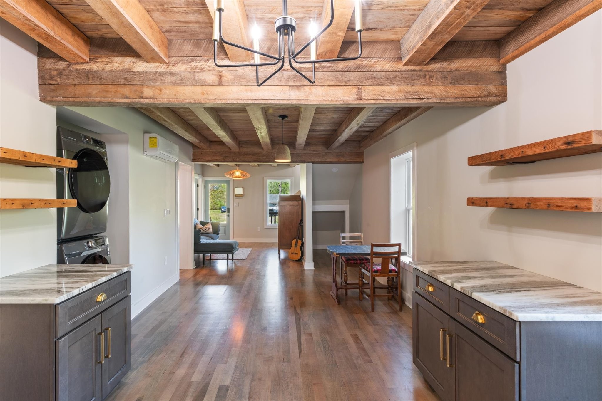 8315 West Sheepneck Road Mount Pleasant, TN 38474 - Photo 11 of 24 a kitchen with a stove and a wooden floors