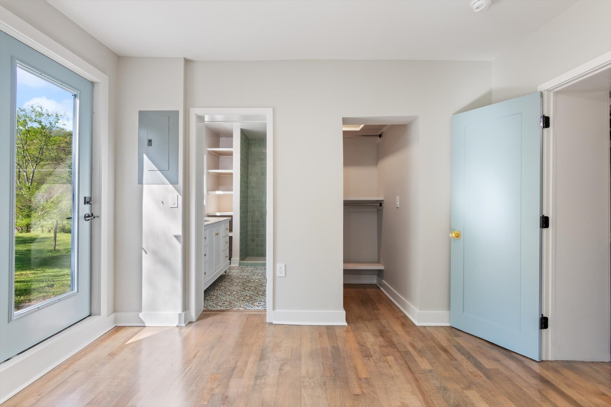 8315 West Sheepneck Road Mount Pleasant, TN 38474 - Photo 13 of 24 a view of an empty room with glass door and a window