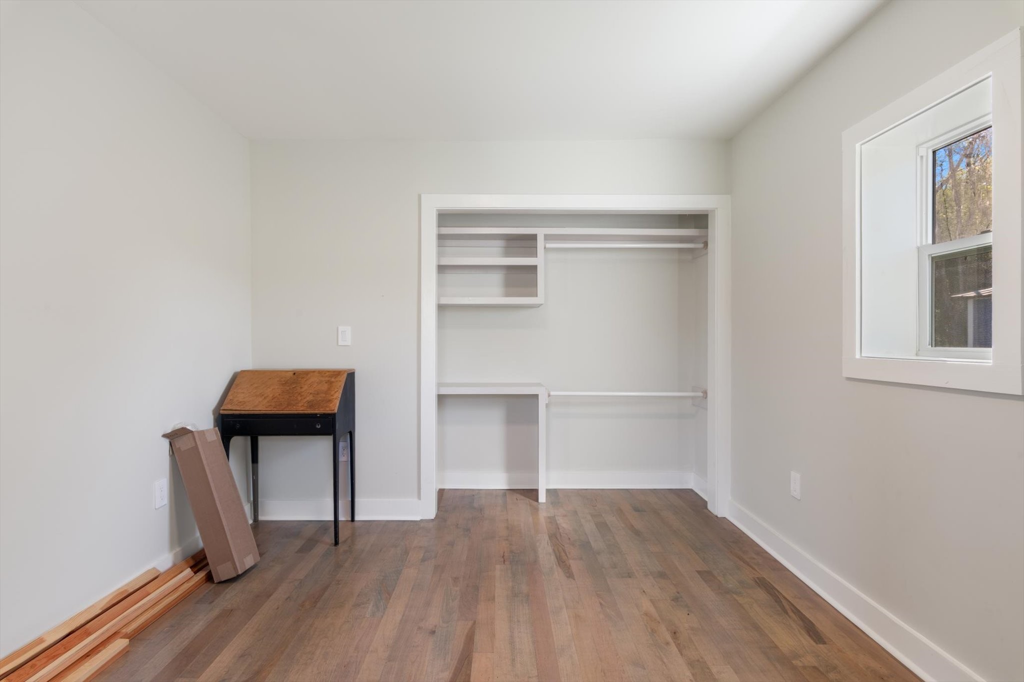 8315 West Sheepneck Road Mount Pleasant, TN 38474 - Photo 18 of 24 a room with a bench and a window