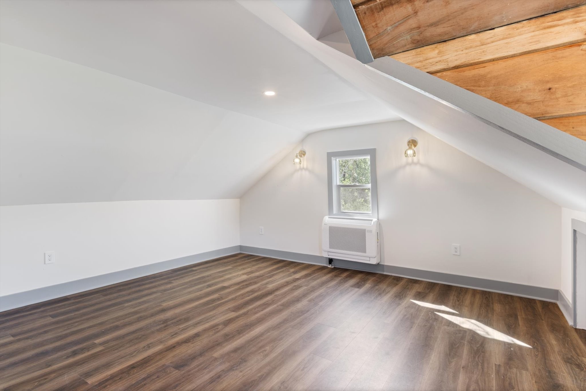 8315 West Sheepneck Road Mount Pleasant, TN 38474 - Photo 20 of 24 wooden floor in an empty room with a window