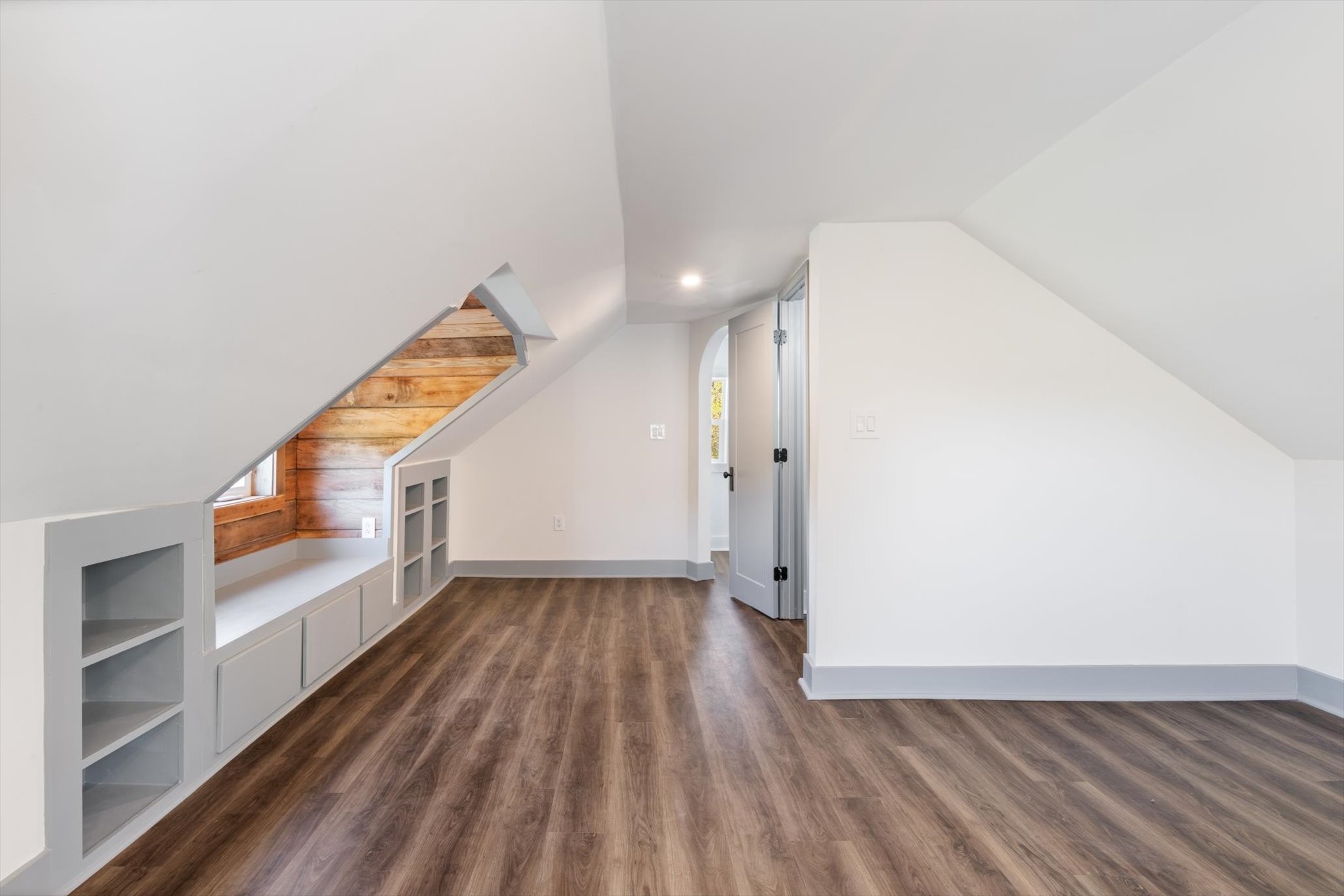 8315 West Sheepneck Road Mount Pleasant, TN 38474 - Photo 21 of 24 a view of an empty room with wooden floor and a window
