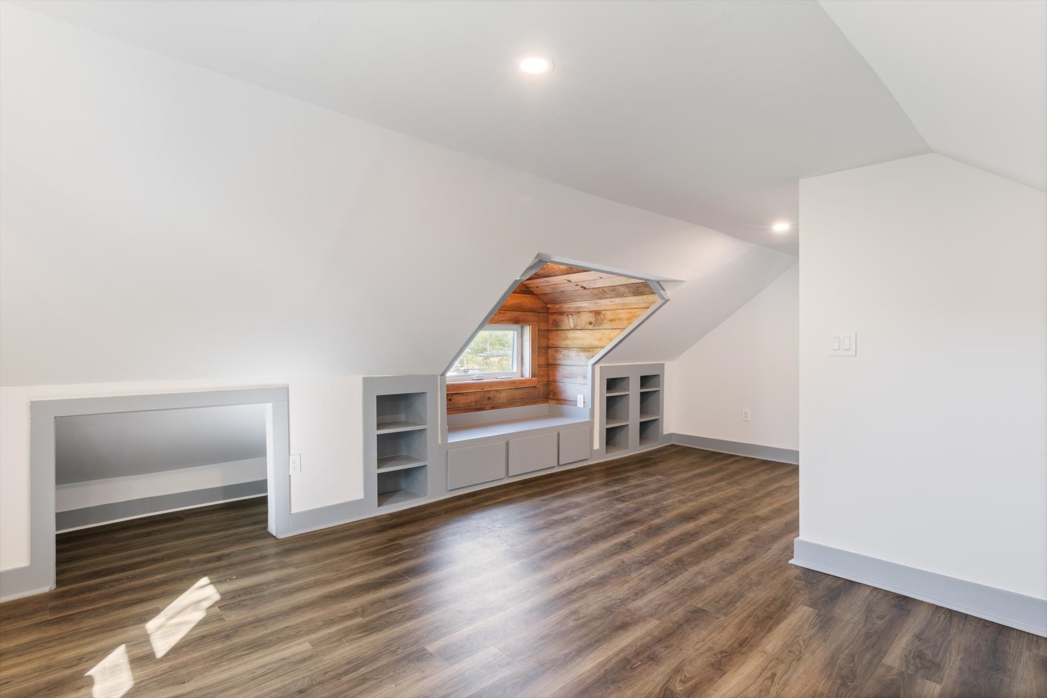 8315 West Sheepneck Road Mount Pleasant, TN 38474 - Photo 22 of 24 wooden floor in an empty room with a window