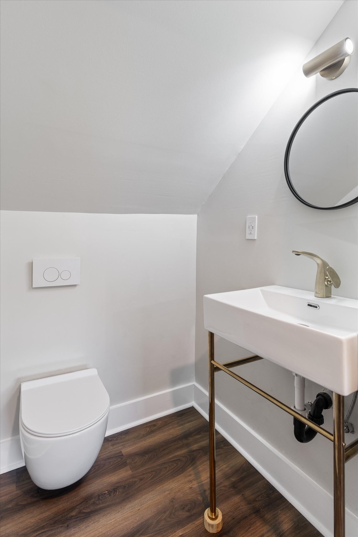 8315 West Sheepneck Road Mount Pleasant, TN 38474 - Photo 23 of 24 a bathroom with a sink mirror and toilet
