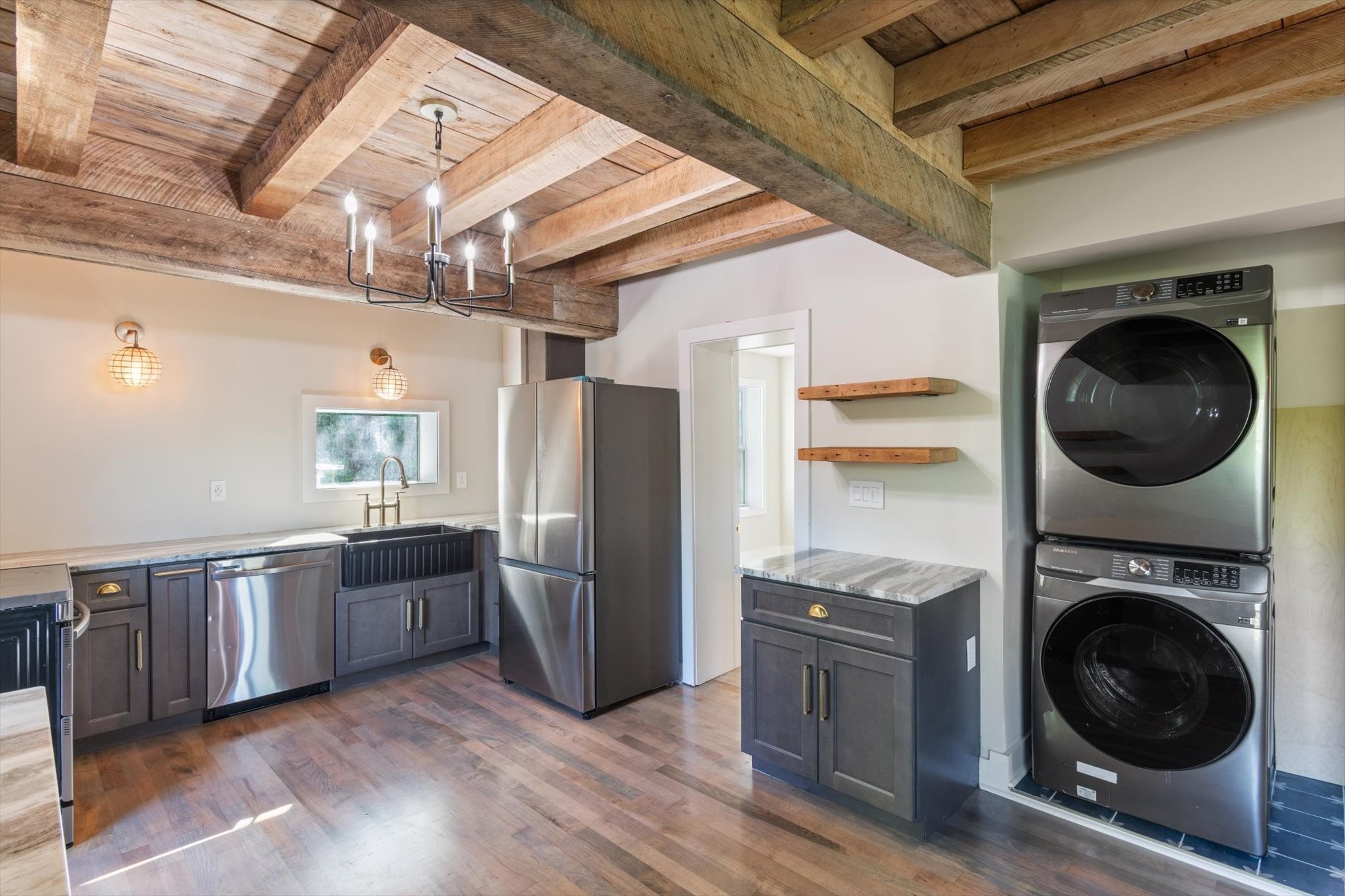 8315 West Sheepneck Road Mount Pleasant, TN 38474 - Photo 9 of 24 a view of a kitchen with stainless steel appliances granite countertop a refrigerator and a sink