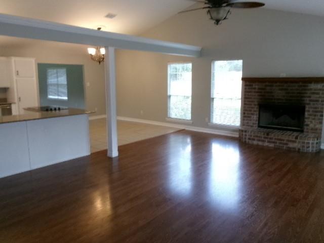 13234 4 Forks Road Keithville, LA 71047 - Photo 11 of 19 an empty room with wooden floor and windows