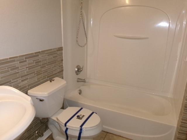 13234 4 Forks Road Keithville, LA 71047 - Photo 12 of 19 a bathroom with a toilet and a shower