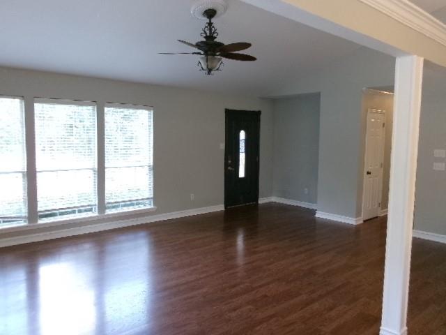 13234 4 Forks Road Keithville, LA 71047 - Photo 6 of 19 a view of an empty room with wooden floor and a window