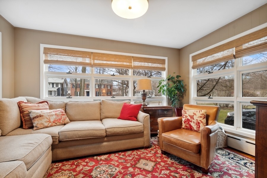 525 Sunset Road Winnetka, IL 60093 - Photo 9 of 42 a living room with furniture and a large window