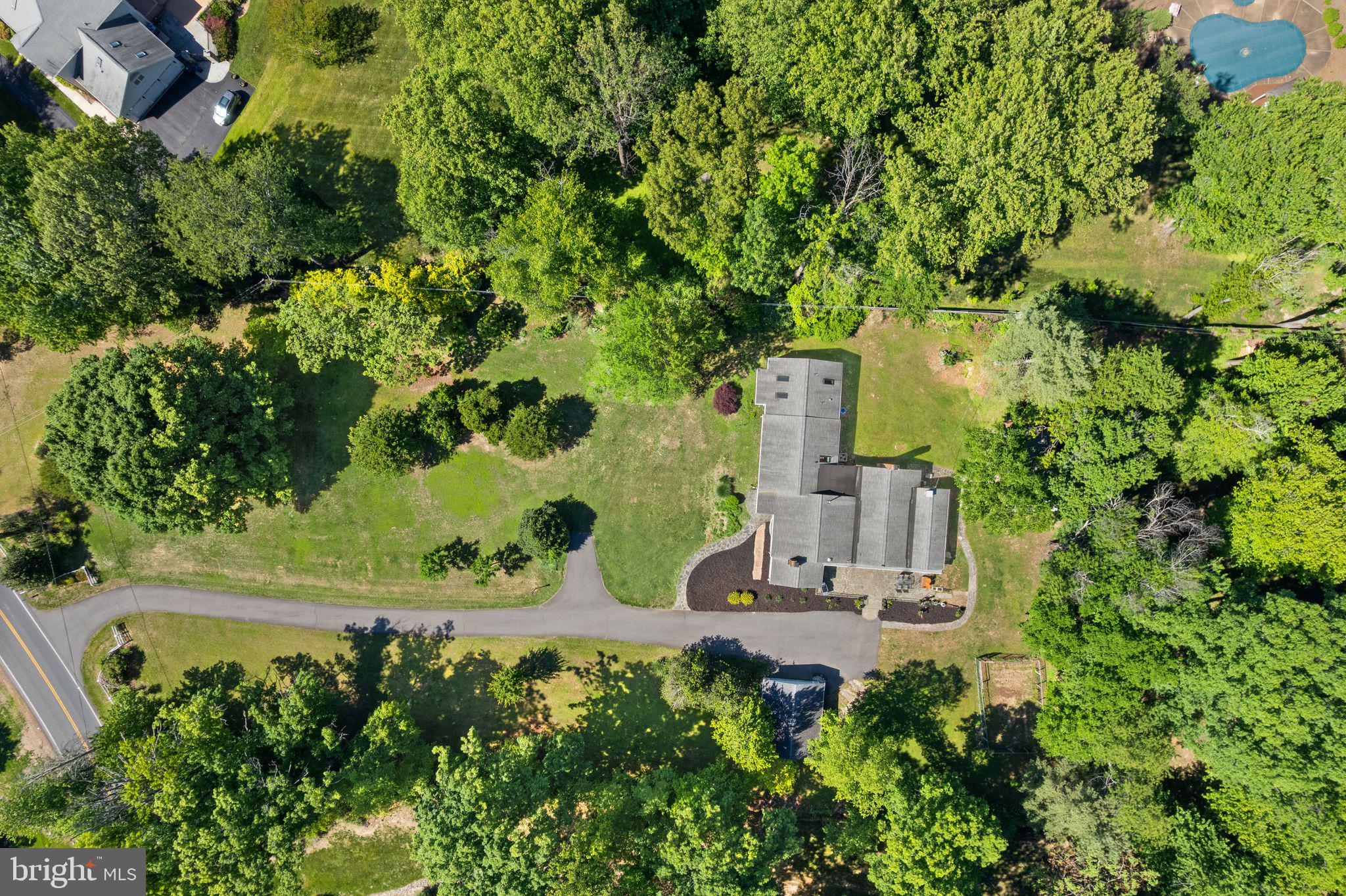 815 Seneca Road Great Falls, VA 22066 - Photo 55 of 61 an aerial view of a house with a yard