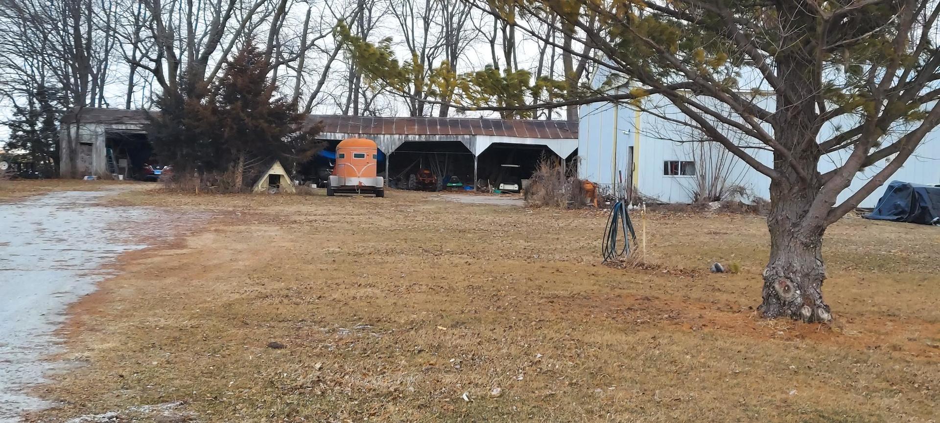 1640 170th Avenue Reynolds, IL 61279 - Photo 2 of 33 a view of a house with a snow in the yard