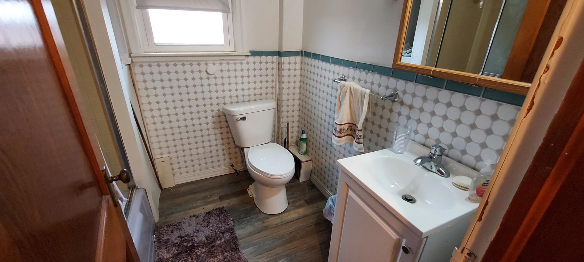 1640 170th Avenue Reynolds, IL 61279 - Photo 26 of 33 a bathroom with a sink and a toilet