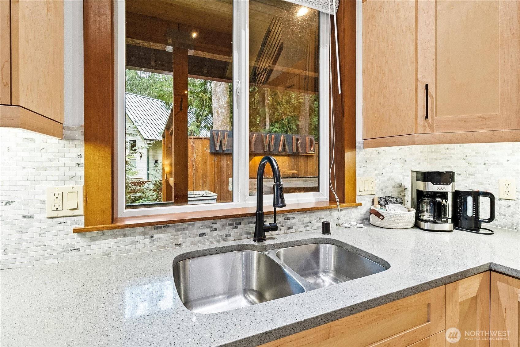 7381 Scott Place Deming, WA 98244 - Photo 11 of 40 a kitchen sink with a granite countertop window