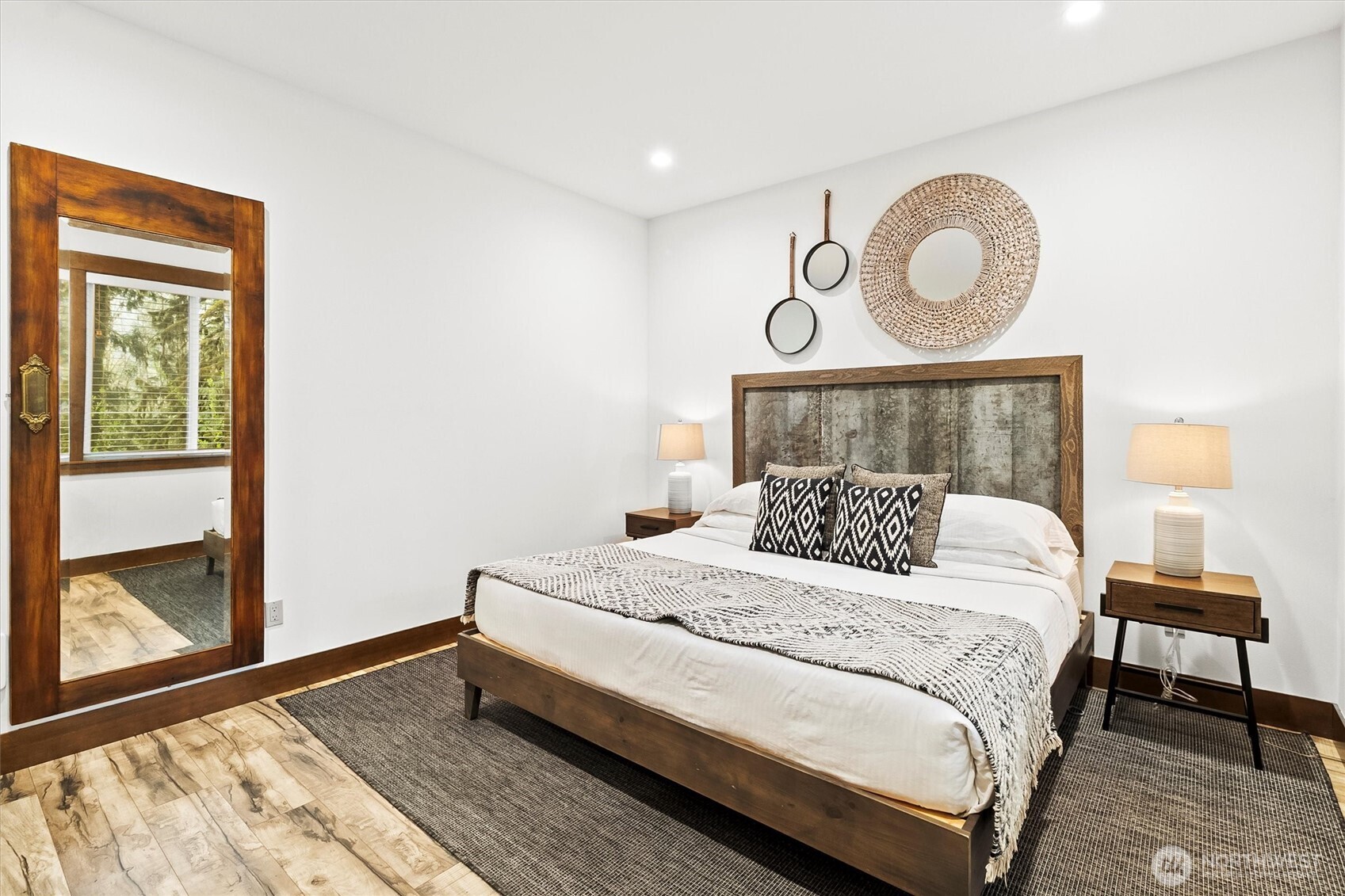 7381 Scott Place Deming, WA 98244 - Photo 13 of 40 a bedroom with a bed and large window