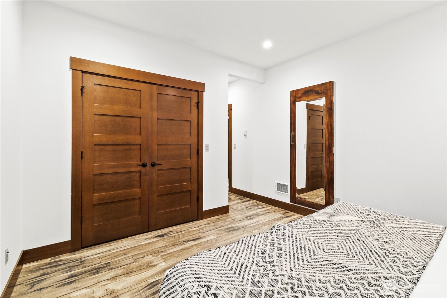 7381 Scott Place Deming, WA 98244 - Photo 14 of 40 a bedroom with a bed and a dresser