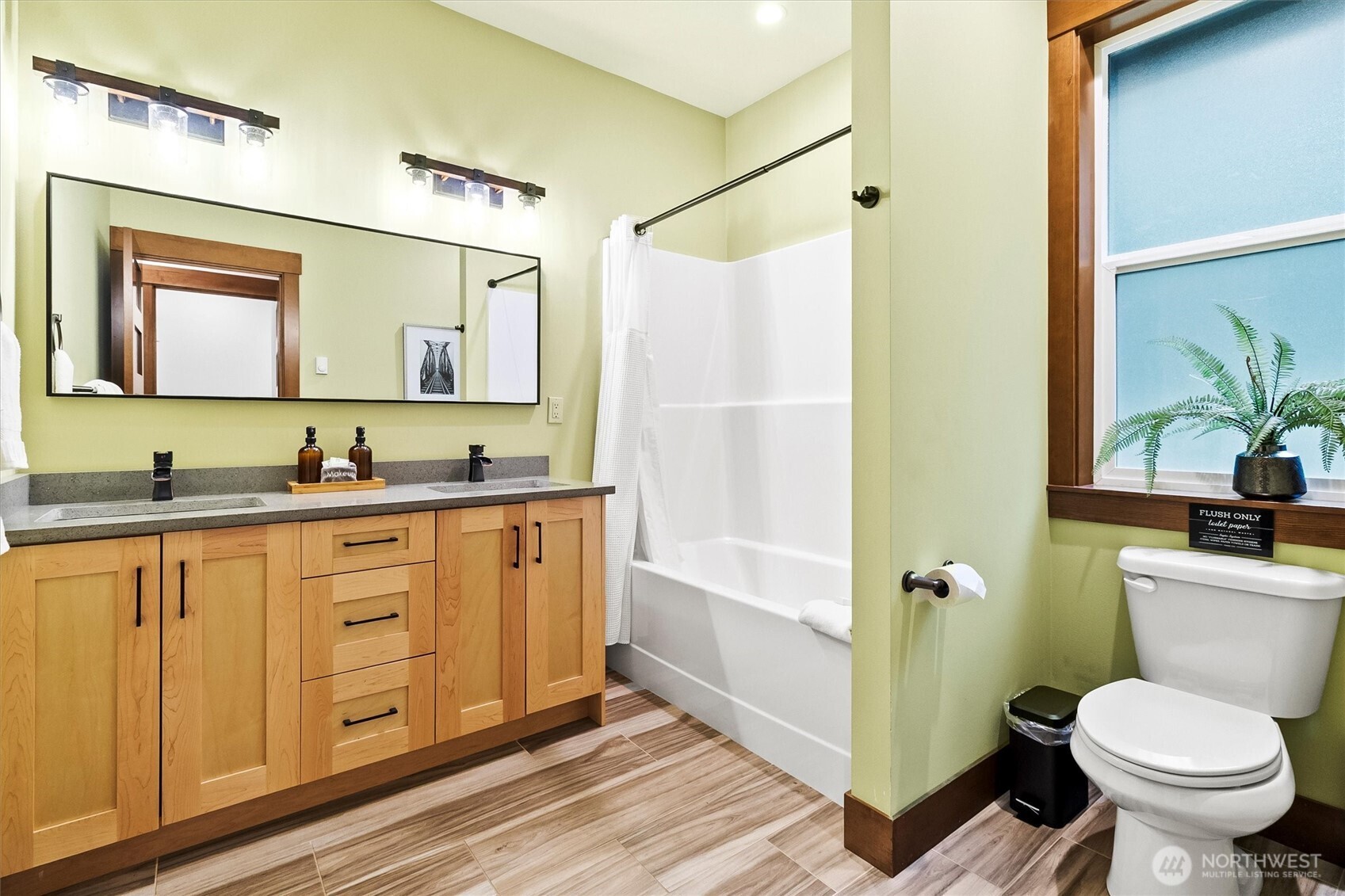 7381 Scott Place Deming, WA 98244 - Photo 15 of 40 a spacious bathroom with a granite countertop sink toilet and shower