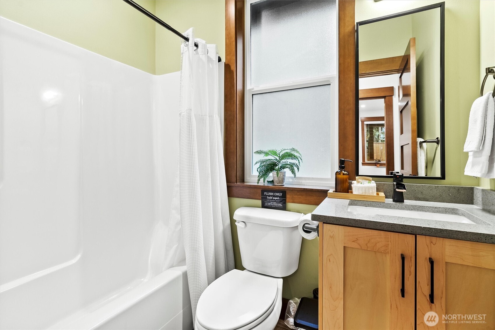 7381 Scott Place Deming, WA 98244 - Photo 17 of 40 a bathroom with a granite countertop sink toilet and shower