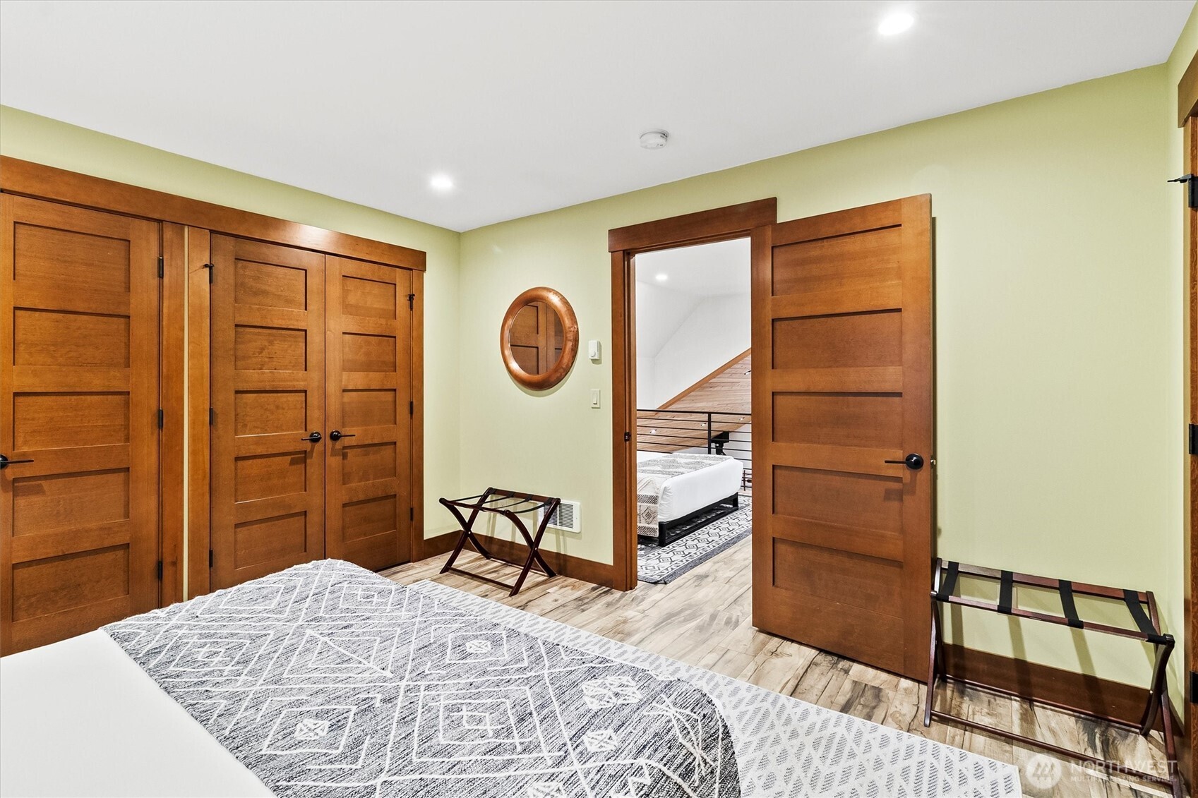 7381 Scott Place Deming, WA 98244 - Photo 21 of 40 a bedroom with a bed and a dresser