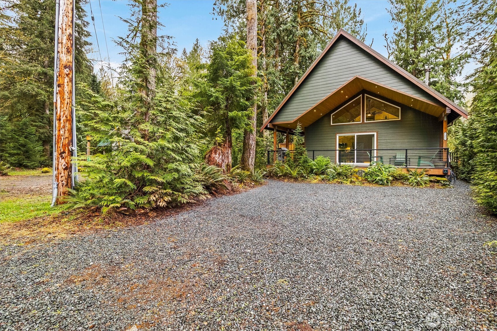 7381 Scott Place Deming, WA 98244 - Photo 35 of 40 a front view of a house with garden