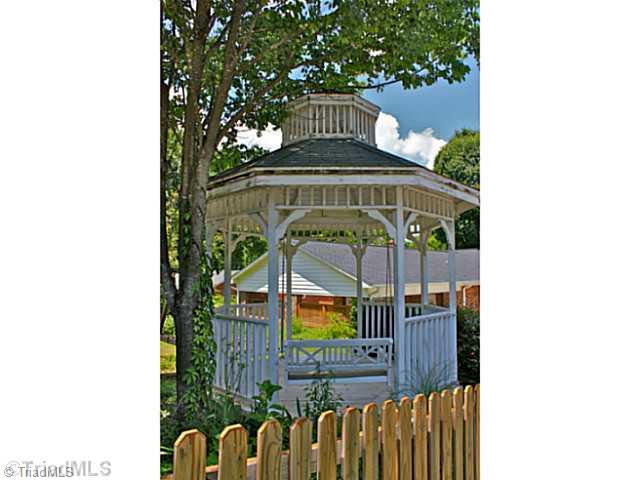 4601 Highberry Road Greensboro, NC 27410 - Photo 15 of 16 Exterior Back. Great gazebo