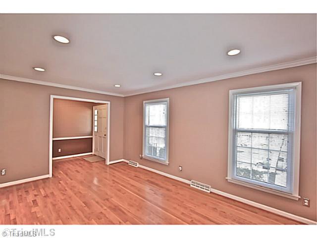 4601 Highberry Road Greensboro, NC 27410 - Photo 3 of 16 Living Room. Large living room with gleaming hardwood floors