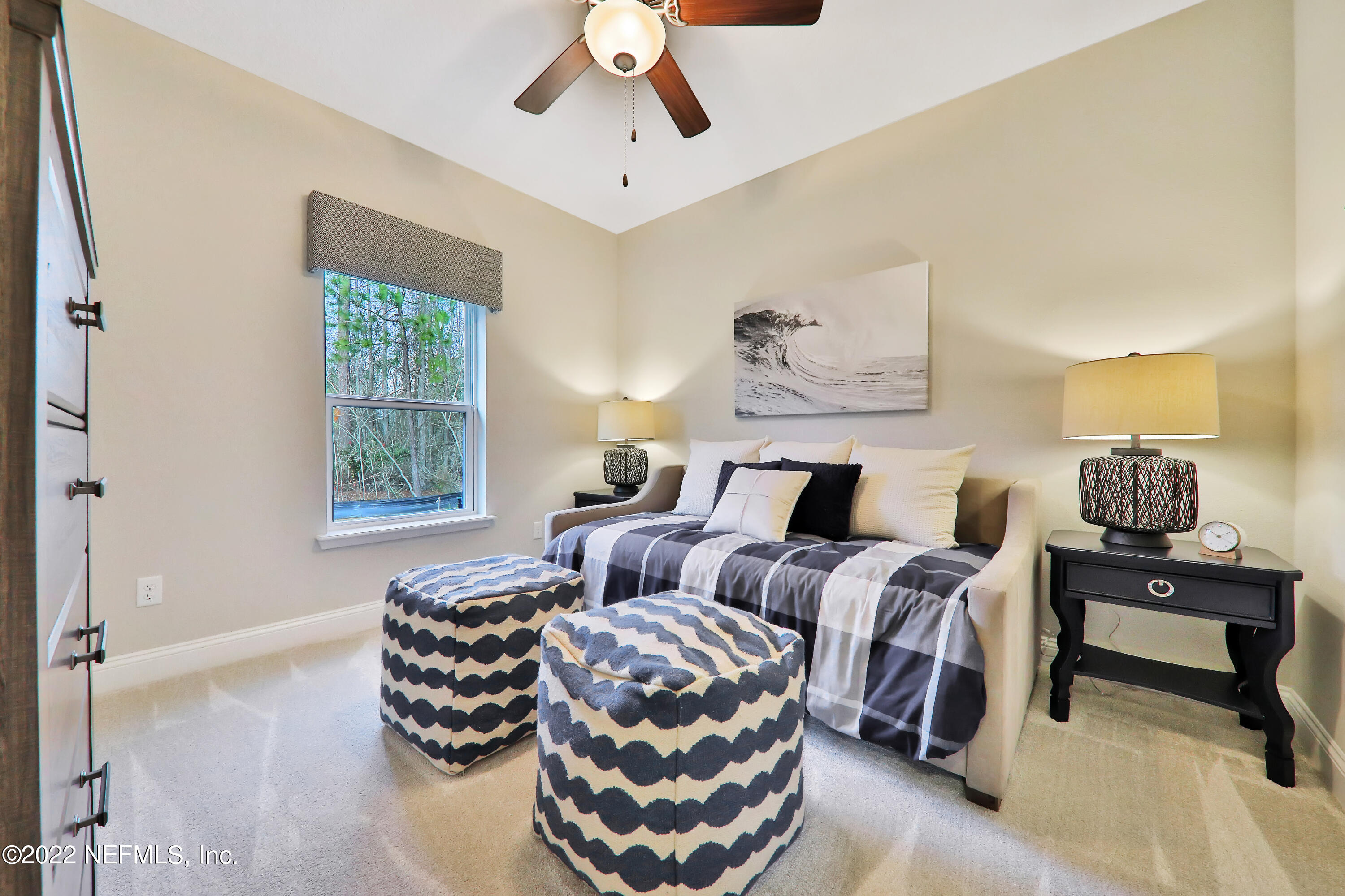 608 Ivory Palm Road Orange Park, FL 32073 - Photo 11 of 33 a bedroom with bed and window