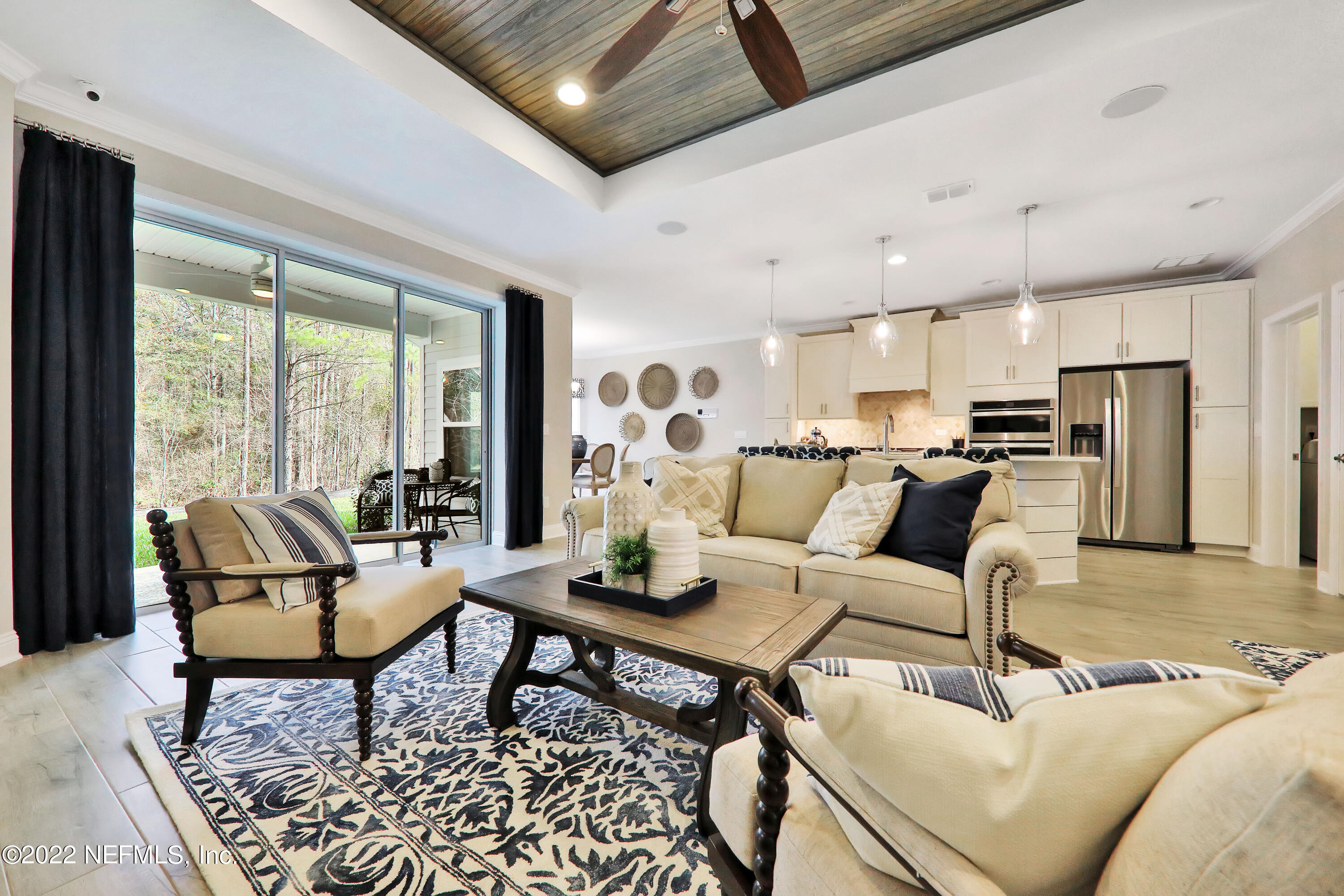 608 Ivory Palm Road Orange Park, FL 32073 - Photo 17 of 33 a living room with furniture and a large window