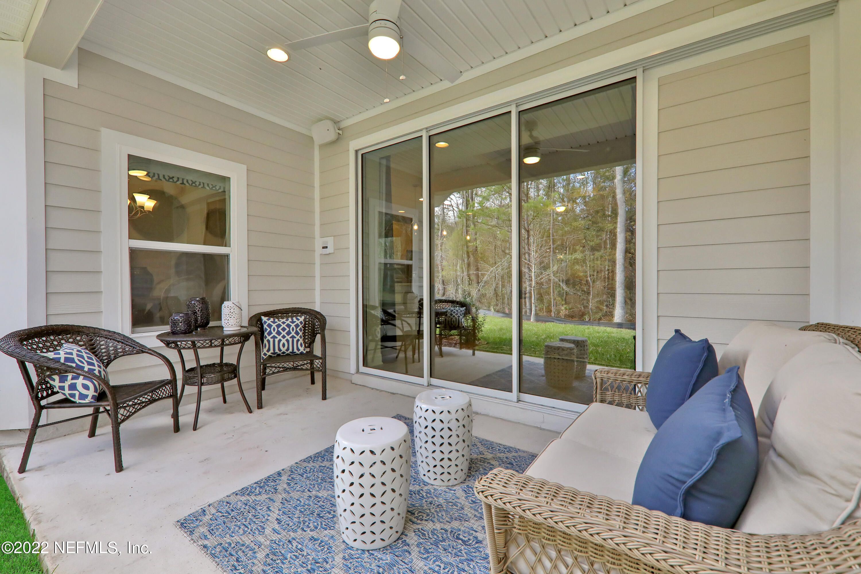 608 Ivory Palm Road Orange Park, FL 32073 - Photo 27 of 33 a living room with furniture and a large window