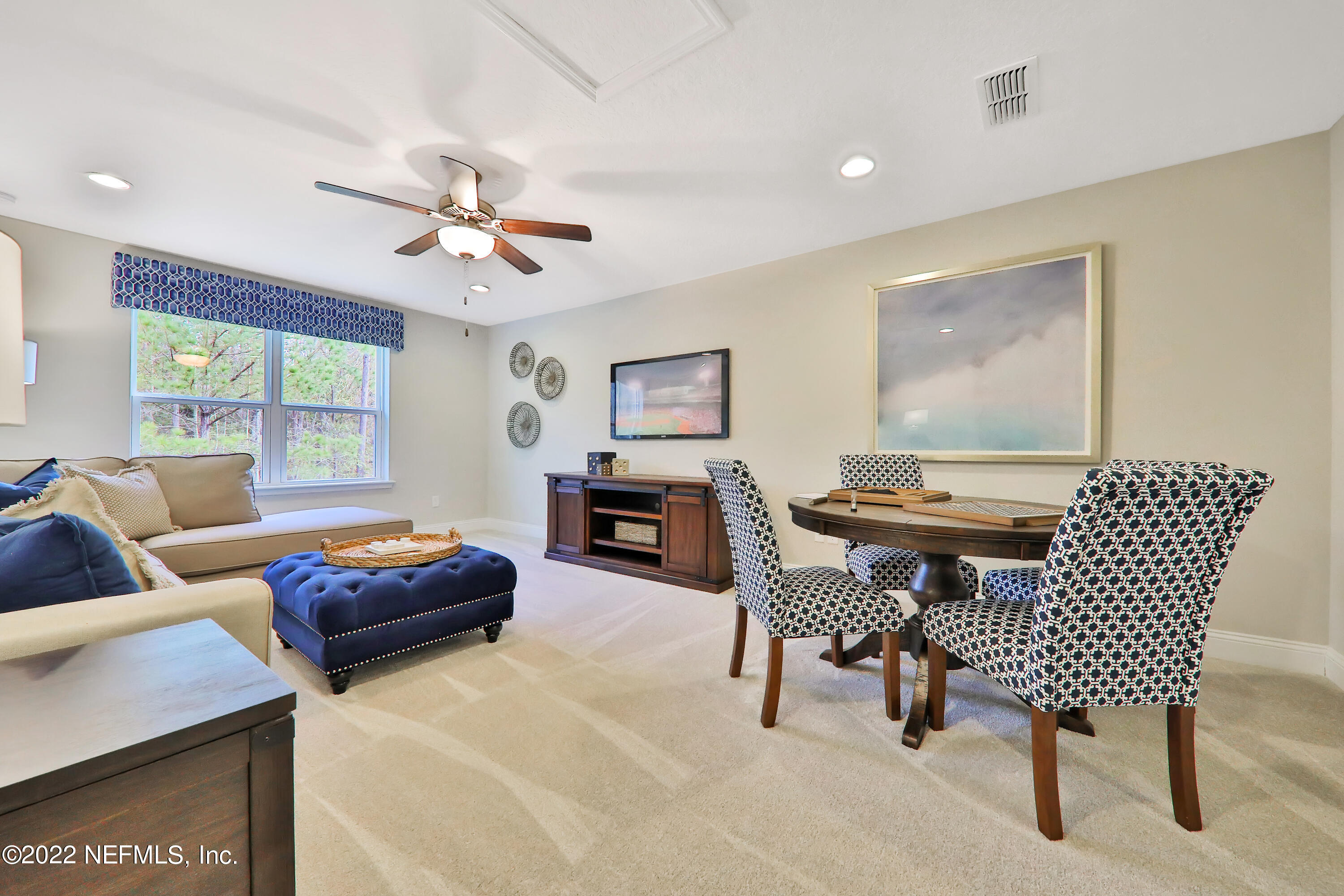 608 Ivory Palm Road Orange Park, FL 32073 - Photo 30 of 33 a living room with furniture a piano and a window