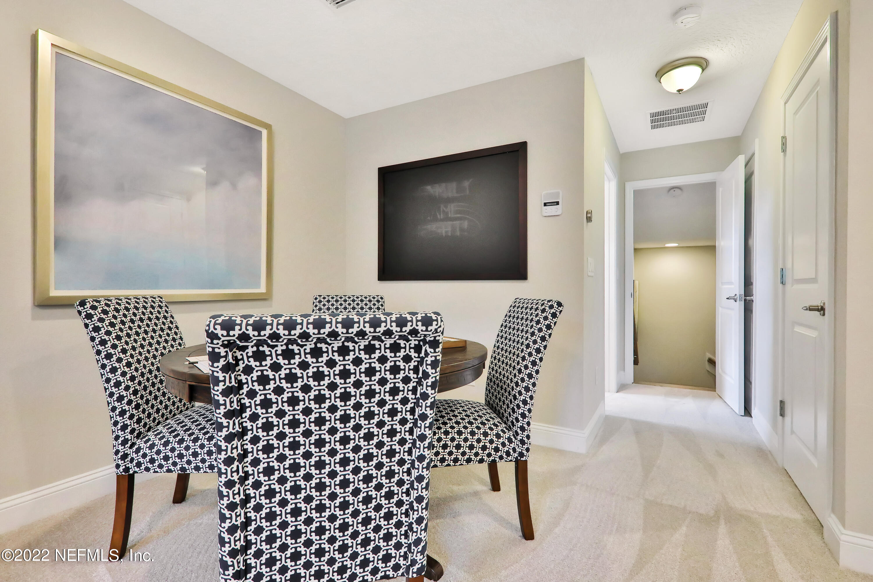 608 Ivory Palm Road Orange Park, FL 32073 - Photo 31 of 33 a bathroom with a sink a mirror and a shower