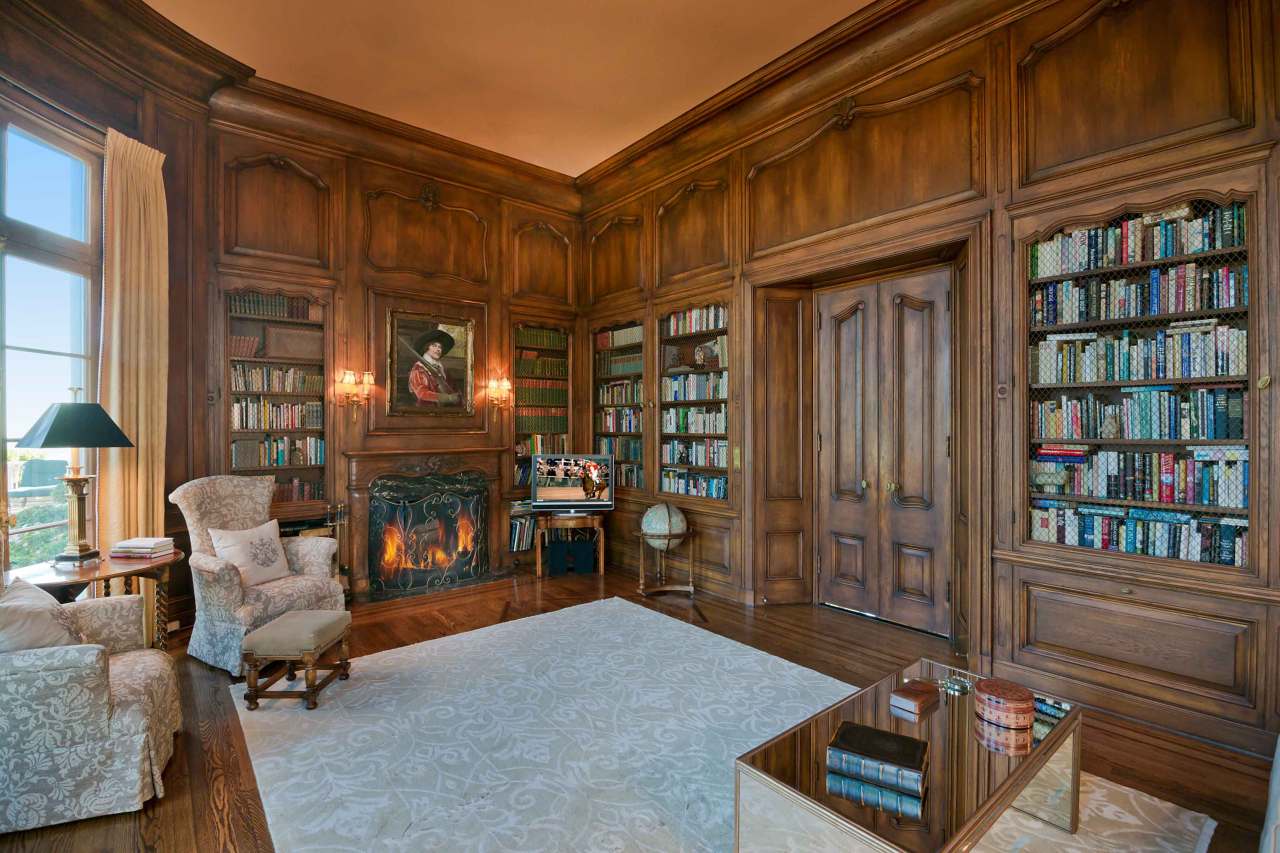 931 Las Alturas Road Santa Barbara, CA 93103 - Photo 5 of 9 a living room with furniture a rug and a book shelf