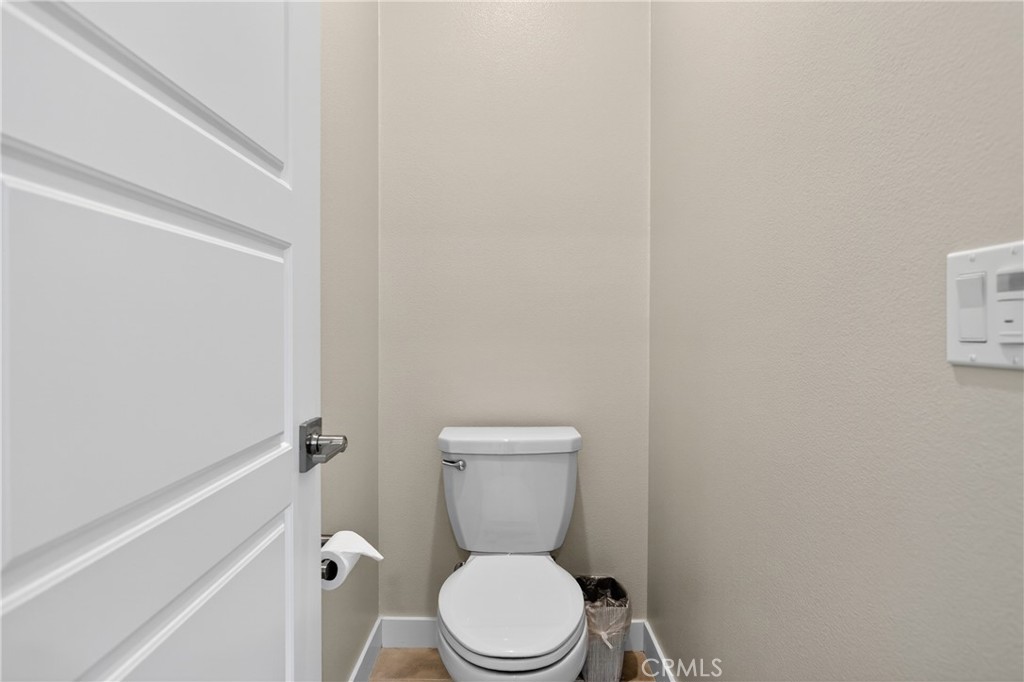 382 Chorus Irvine, CA 92618 - Photo 24 of 38 a white toilet sitting next to a shower