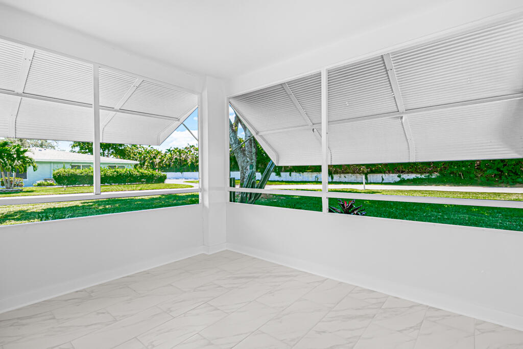 405 High Point Boulevard North, Unit D Delray Beach, FL 33445 - Photo 17 of 51 Screened Patio/FL Room