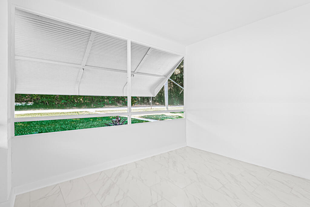 405 High Point Boulevard North, Unit D Delray Beach, FL 33445 - Photo 18 of 51 Screened Patio/FL Room