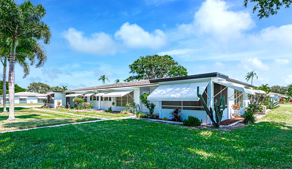 405 High Point Boulevard North, Unit D Delray Beach, FL 33445 - Photo 2 of 51 Exterior Front
